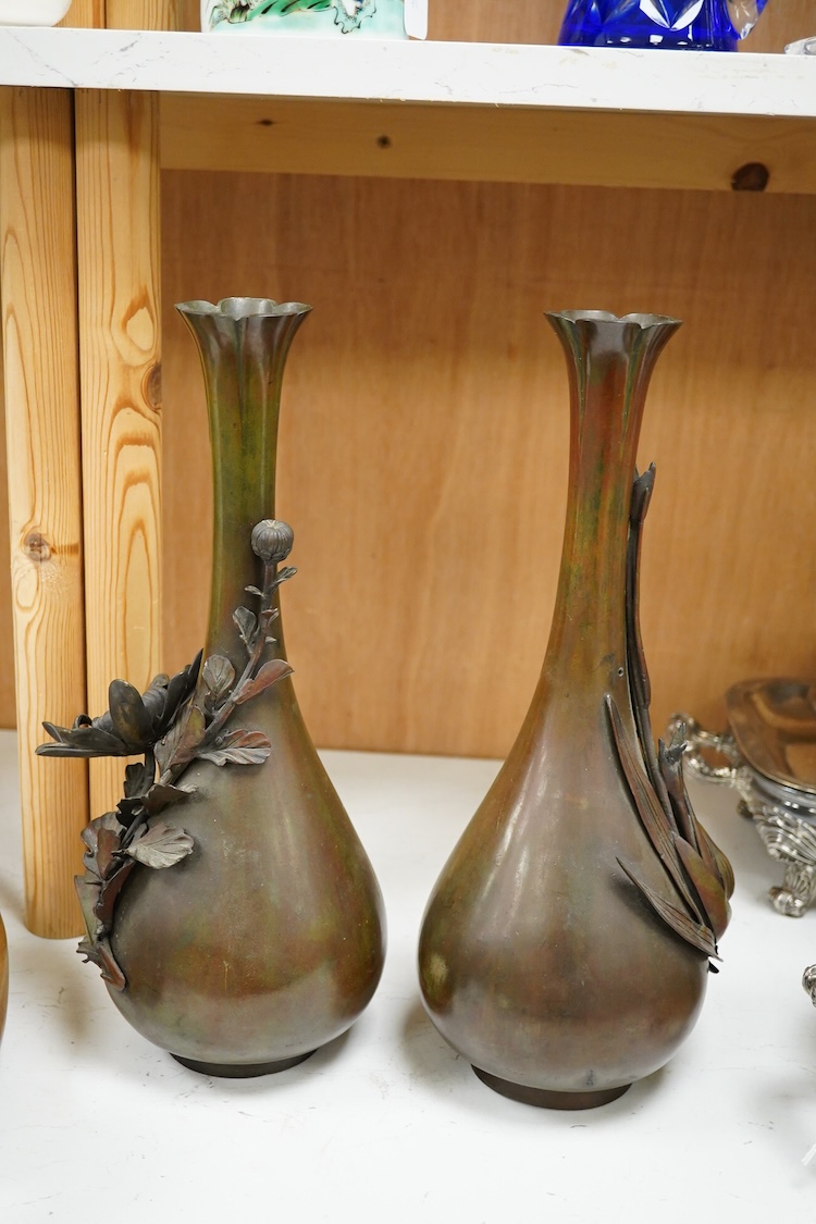 A pair of Japanese Meiji bronze floral vases, 36.5cm high